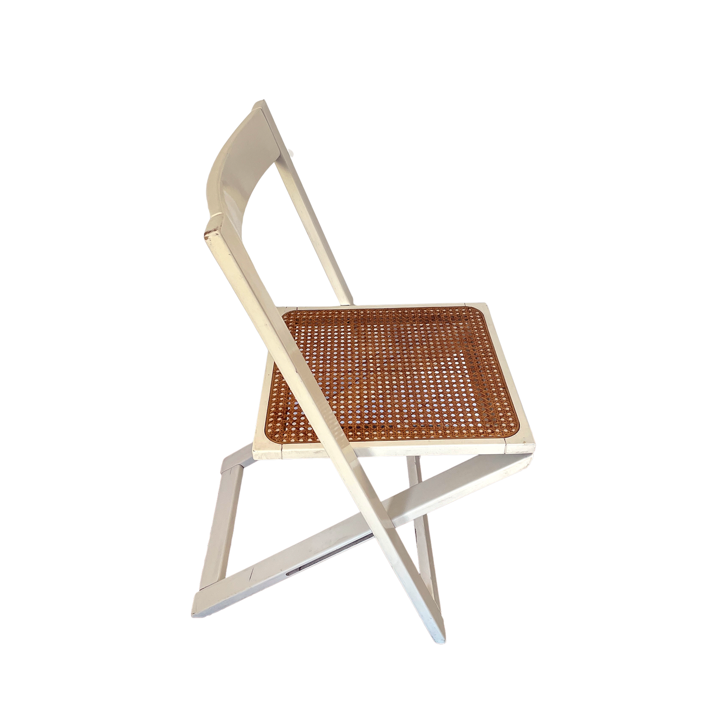Chair with wicker seat and white frame on a white background
